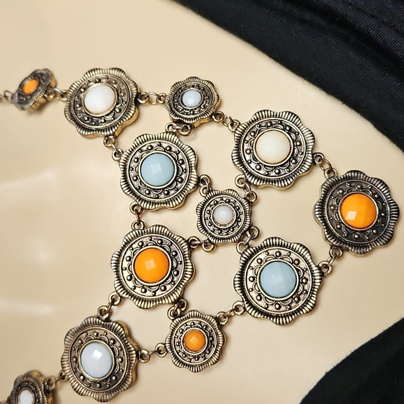 STATEMENT BIB STYLE NECKLACE WITH ORANGE,BLUE,AND WHITE STONES - Picture 2 of 8
